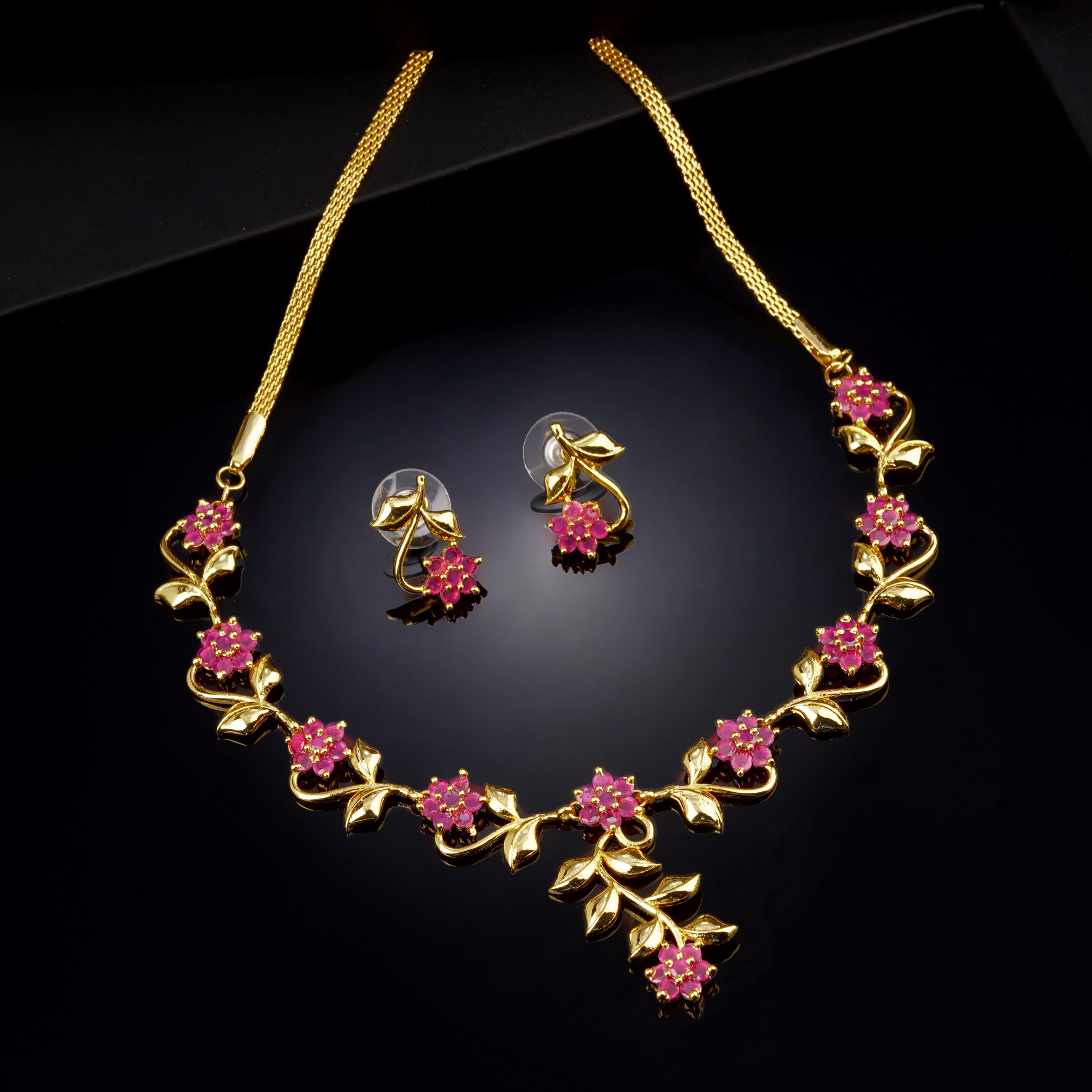 Estele Gold Plated CZ Flower Shaped Necklace Set with Pink Stones for Women 
