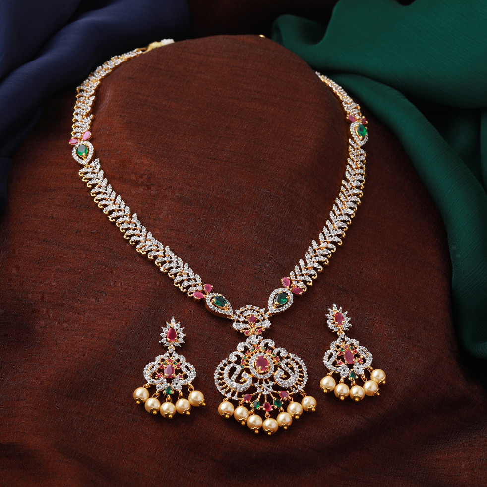 Estele Gold Plated CZ Peacock Inspired Long Necklace Set With Pearls